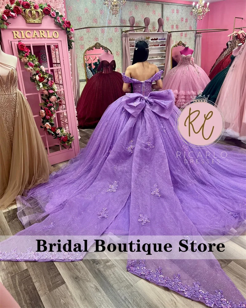 New 2024 Lavender Purple Princess Quinceanera Dresses With Big Bow Ball Gown Appliques Crystals Beads Sweet 15th Dress 1